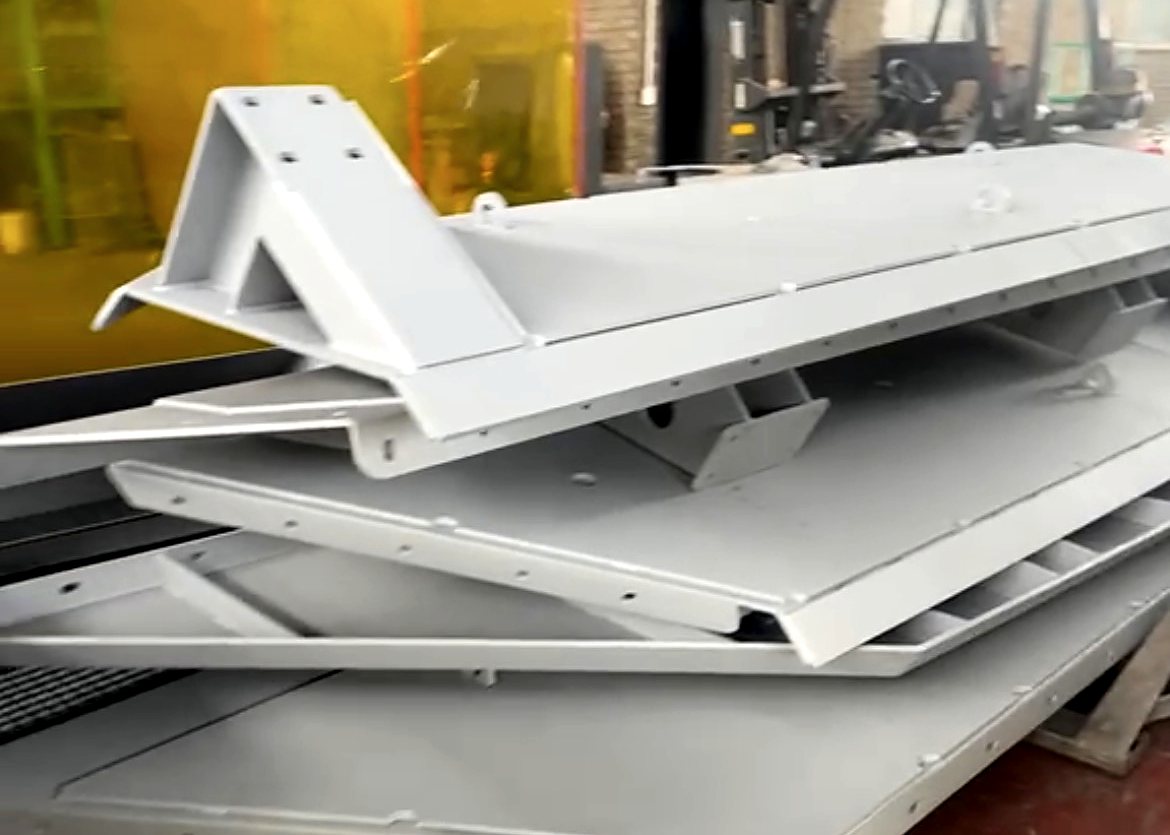 Welded machine frames finished in grey final-coat paint
